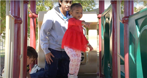 high school student in early childhood education cte pathway plays with 2 headstart aged children on the playground